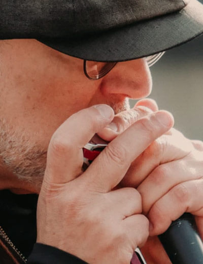 Man playing harmonica